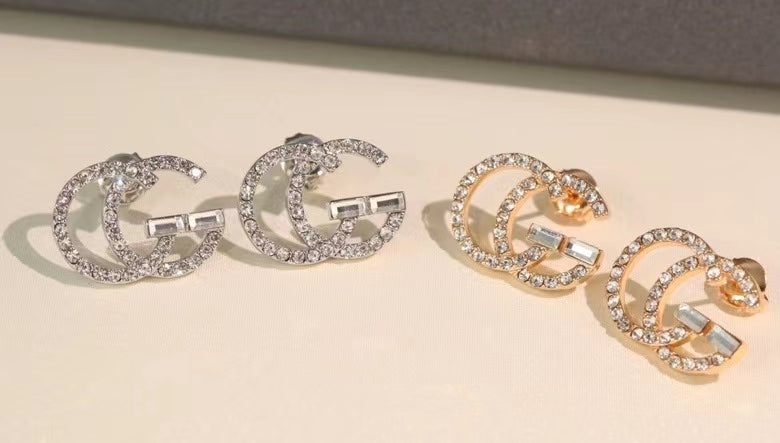 GE104 classic logo earrings with diamonds, simple and versatile