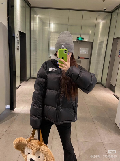 105918  Men's and women's classic down jacket from the north clother