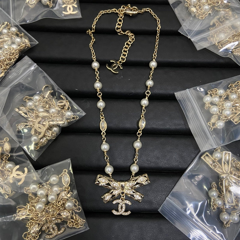 CHN66  Women's bow pearl necklace jewelry
