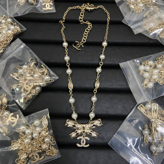 CHN66  Women's bow pearl necklace jewelry