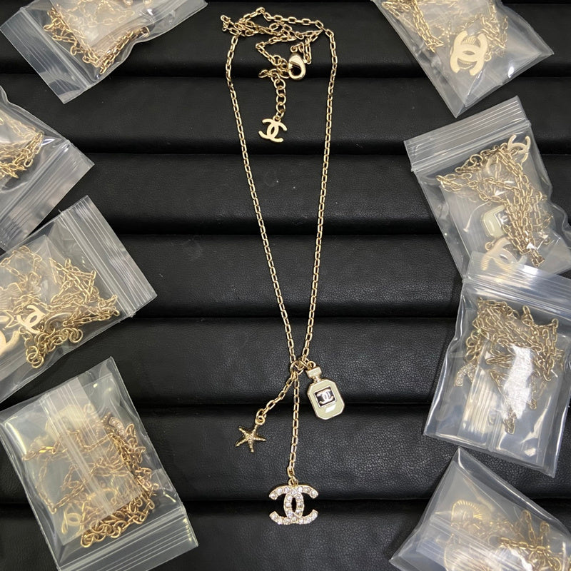 CHN67  Women's perfume bottle tassel necklace jewelry