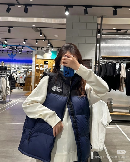 110429  Men's and women's classic high and full embroidered logo down vest clothes on the north side